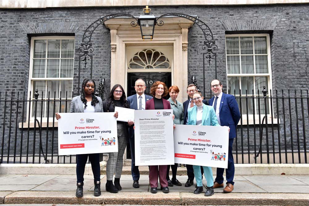 Young carers protest outside 10 downing street.